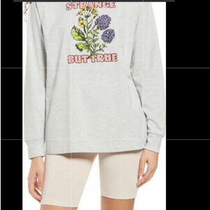 Strange But True Long Sleeve Organic
Cotton Blend Graphic Tee S